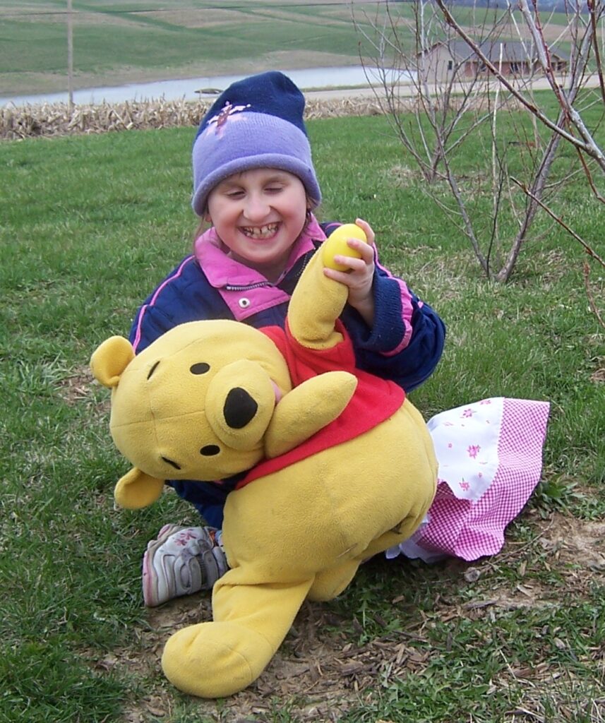 rachel and pooh picking up eggs